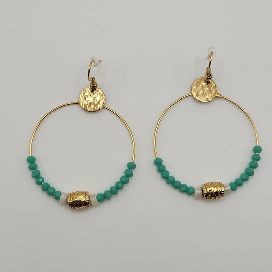 Daniela, Boucles d'oreilles créoles dorées à l'or fin bleues.