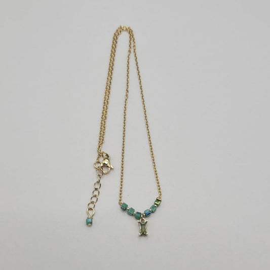 Gabrielle, collier orné de perles en verre et métal doré à l'or fin.