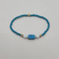 Alix, Bracelet en perles en verre, perles de culture et perle naturelle en apatite.