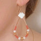 Emma, Boucles d'oreilles corail, créoles gouttes dorées à l'or fin.